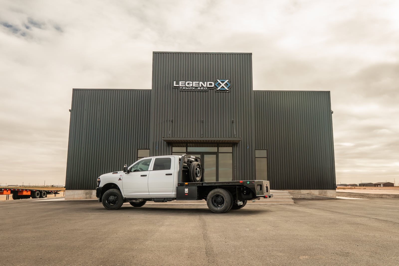 Legend X Spartan work truck parked in front of the Legend X headquarters.