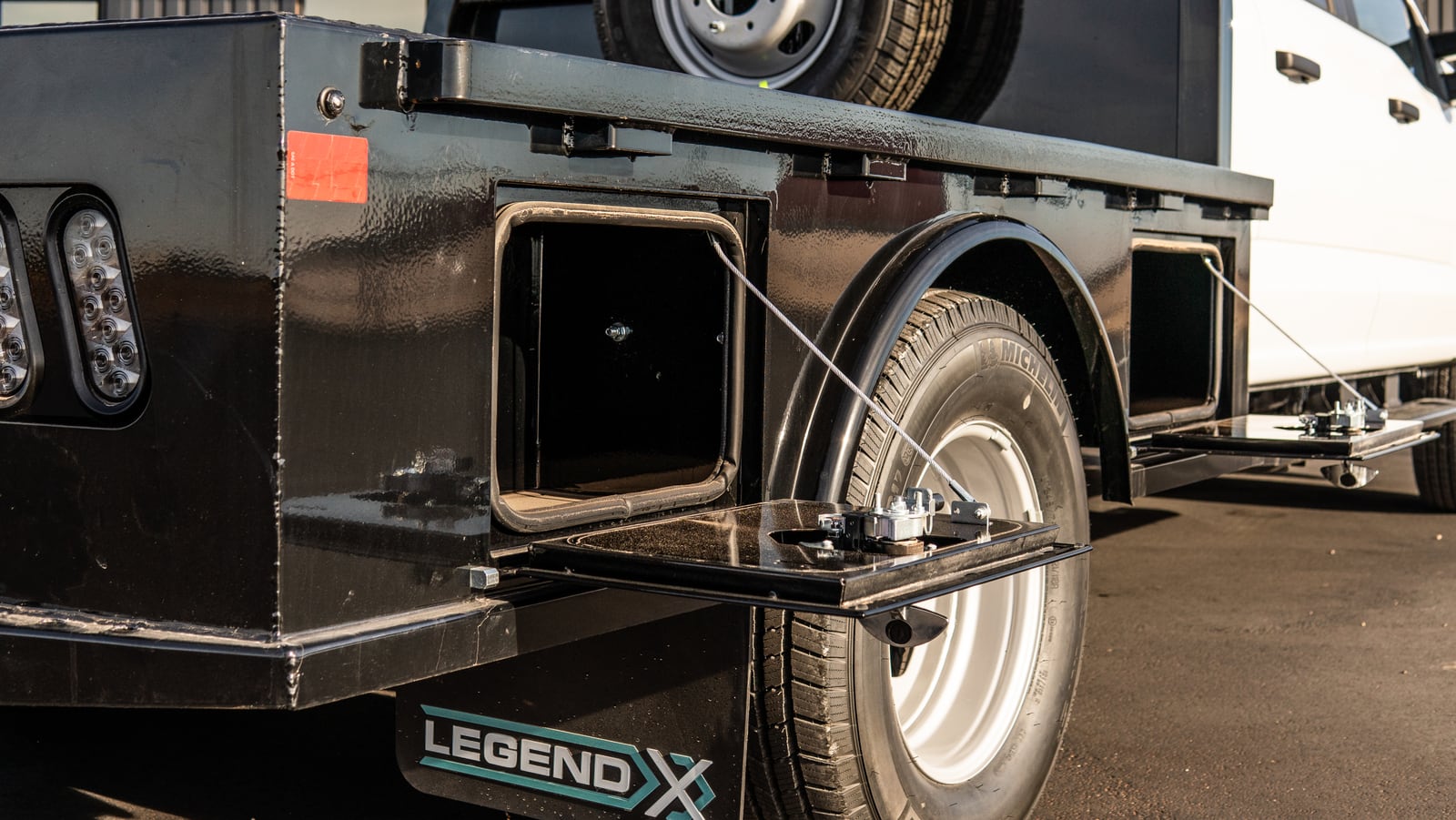 Open side storage box on a black Legend X Viking flatbed.
